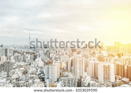 Asia business concept for real estate and corporate construction - panoramic modern city skyline aerial view of bunkyo under gray sky and cloud, tokyo, Japan