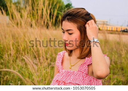 Asian cute short hair girl in the garden