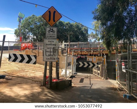 Warning signs leading to Taylors Bridge in West Hindmarsh, South Australia, during ongoing construction.