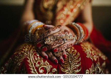 Pakistani Indian Wedding Bride Showing Henna Designs and jewelry