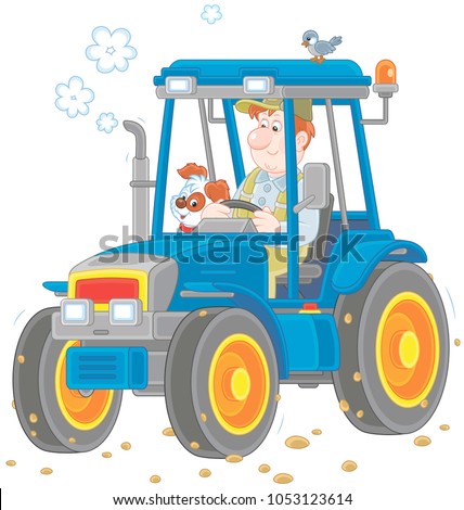 Smiling worker driving his wheeled tractor