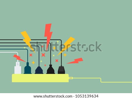 Plug in full power outlet, overload charger Royalty-Free Stock Photo #1053139634