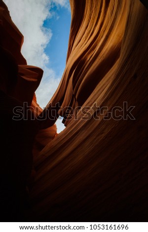 Beautiful curvy rock formations in a sandstone in Lower Antelope Canyon in Page, Arizona, USA.