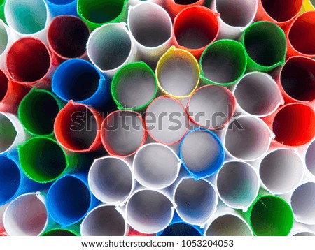 Drinking straws in many colors captured from many angles. Carrying summer hot mood with fresh and vivid shapes and colors.