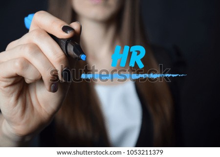 The businessman writes a blue marker inscription:HR