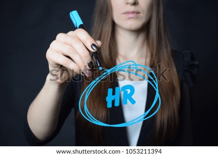 The businessman writes a blue marker inscription:HR