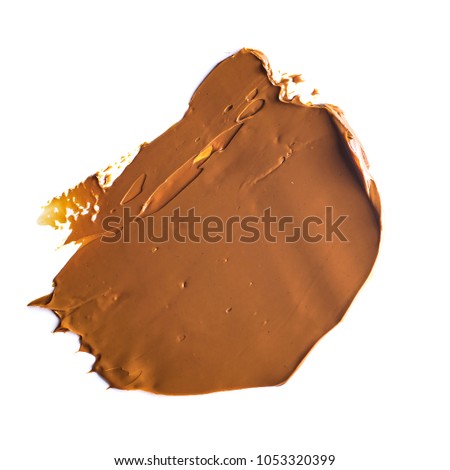 stains of oil paint on a white background-ocher