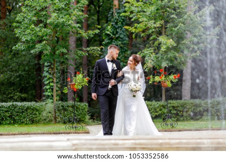 Walk the newlyweds. The bride and groom in nature. Wedding day. The best day of a young couple