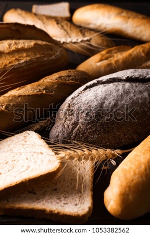 Top view of different kinds of bread with cereals isolated