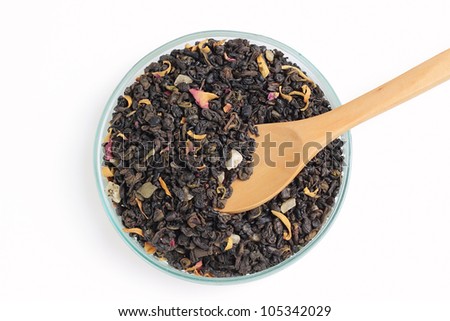 Closeup picture of aromatic green tea  on white background