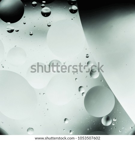 mix oil and water, color background with soft defocusing, macro abstract