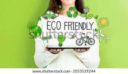 Eco Friendly with woman holding a tablet computer