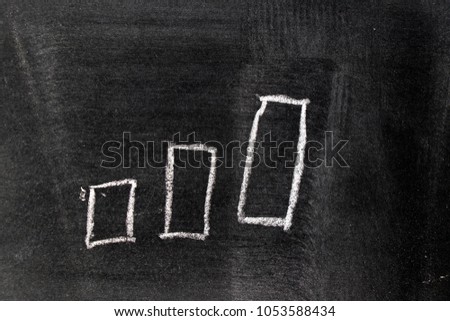 White chalk hand drawing in uptrend barchart  shape on blackboard background