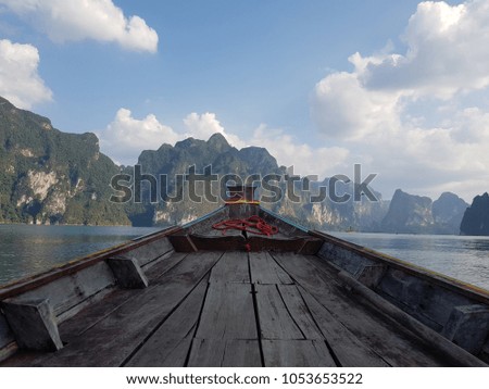 Boat ride to beautiful lake in Khao Sok, Surat Thani ,Thailand.Use for website/banner background, backdrop, montage menu.