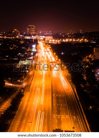 Kuala Lumpur, Malaysia - Light trails on the street of Kuala Lumpur from aerial perspective