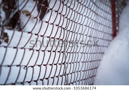 fence in the snow