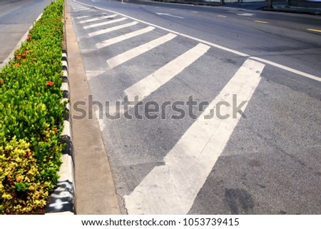 Road marking lines on asphalt background