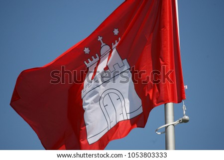 Hamburg, Germany, March 2018, flag of the city of Hamburg blowing in the wind