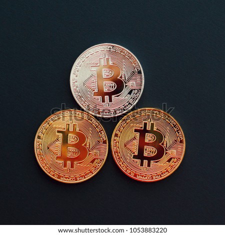 Picture of gold bitcoin over black background. Digital money concept