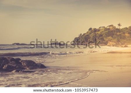 Tropical beach. Beautiful landscape of  Indian ocean, Sri Lanka. Toning photo.