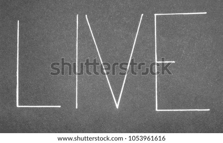 On a black background the word Life is written in a white font
