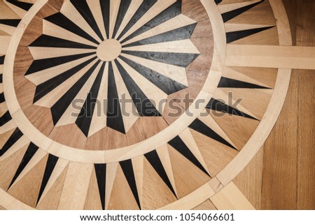Wooden parquet with vintage pattern. Background photo texture