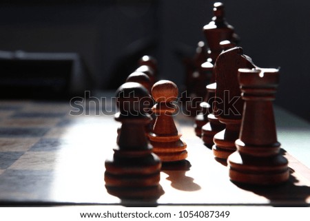 Wooden Chess Pieces on Chess Board