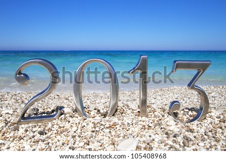 New year 2013 on the beach Royalty-Free Stock Photo #105408968