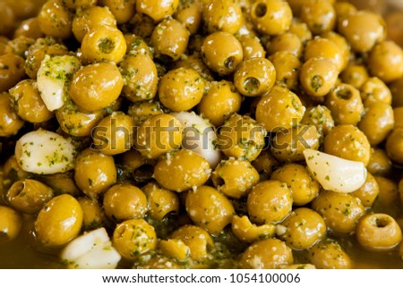 green olives with garlic. Spanish snacks.