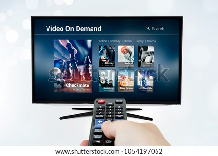 Video on demand VOD application or service on smart TV. Television multimedia stream internet concept Royalty-Free Stock Photo #1054197062