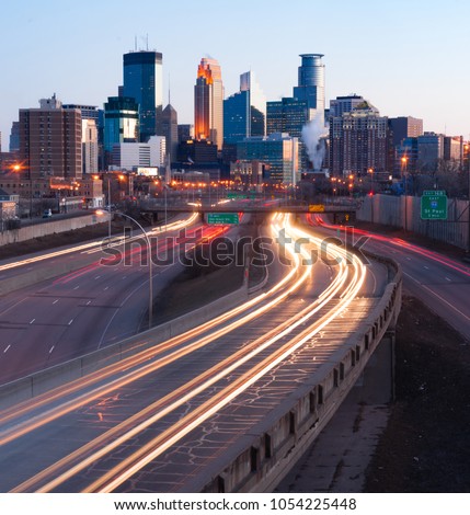 Clear view sunset light infrastructure roads buildings in downtown inner city Minneapolis MN United States