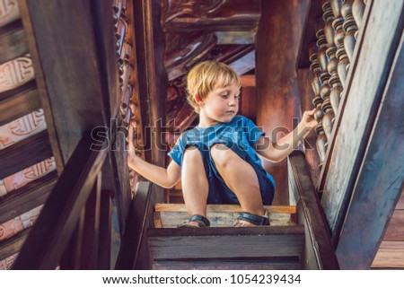 Boy tourist in Pagoda. Travel to Asia concept. Traveling with a baby concept