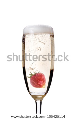 Champagne with strawberry - christmas alcohol cocktail. Isolated on white background