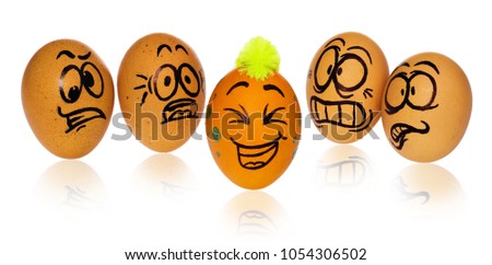 Easter eggs, painted in smiling and terrified cartoon faces. Decorated eggs with funny colorful hairstyles look at one other unique and distinctive Easter egg. Figures on a white background