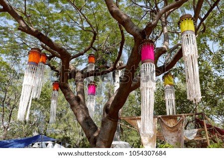 Lamps are made of hanging cloth on decorative tree
