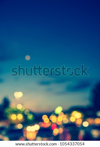 Abstract blurred Colurful bokeh on night time for background usage . (vintage tone)