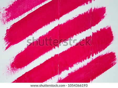 Hand painted bright pink stripes on wood panel background
