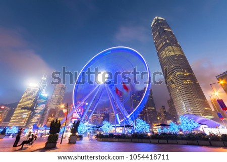 Ferris Wheel in Hong Kong City at dusk