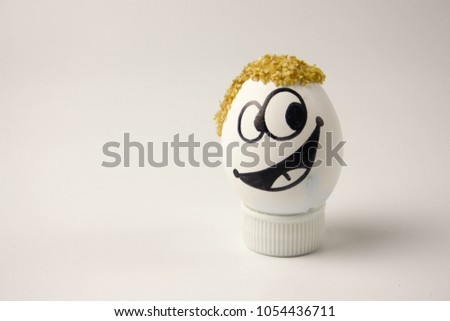 flirt concept. cute and funny egg with painted face and hair. photo for your design
