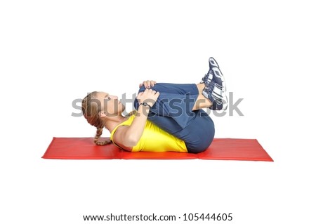 Fit young female yoga instructor showing different exercises on a white background