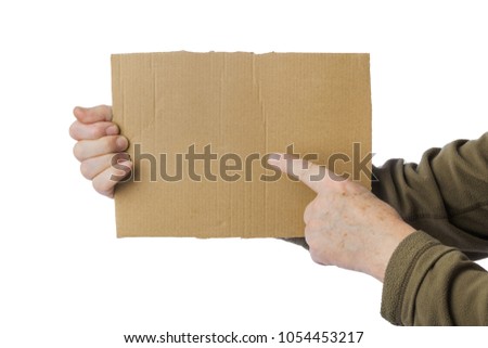 Hand of beggar with cardboard isolated on white background