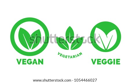 Vegan logo green leaf label template for veggie or vegetarian food package design. Isolated green leaf icon for vegetarian bio nutrition and healthy diet or vegan restaurant menu symbols set Royalty-Free Stock Photo #1054466027