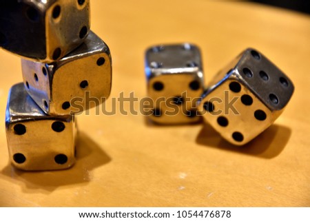 Metal dice on a table