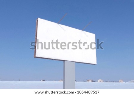 Billboard pure white on sky background in winter