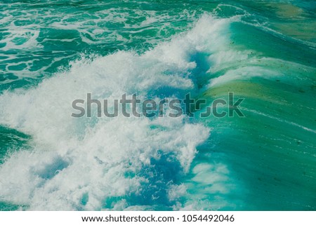 
waves on the Atlantic ocean in the rocky coast of the Caribbean sea in the Aruba island of the Netherlands Antilles
