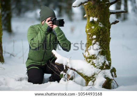 photographer in the snow