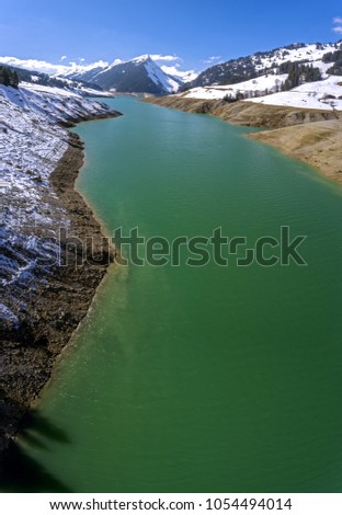 Lac de l'Hongrin is a reservoir in Vaud, Switzerland. The reservoir with a surface area of 1.60 km2 (0.62 sq mi) is located in the municipalities of Château-d'Œx and Ormont-Dessous. The two arch dams 