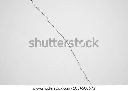 White pastel rough crack cement texture stone concrete,rock plastered stucco wall; painted flat fade background gray solid floor grain.