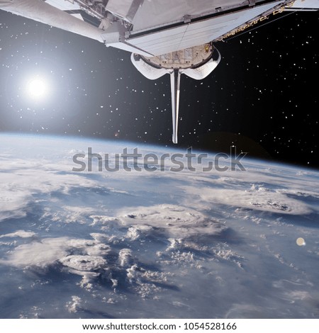 Spaceship in outer space. The elements of this image furnished by NASA.