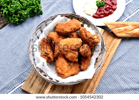 Crispy fried chicken wings with Bread crumbs (European style).
Chicken wing menu for children.